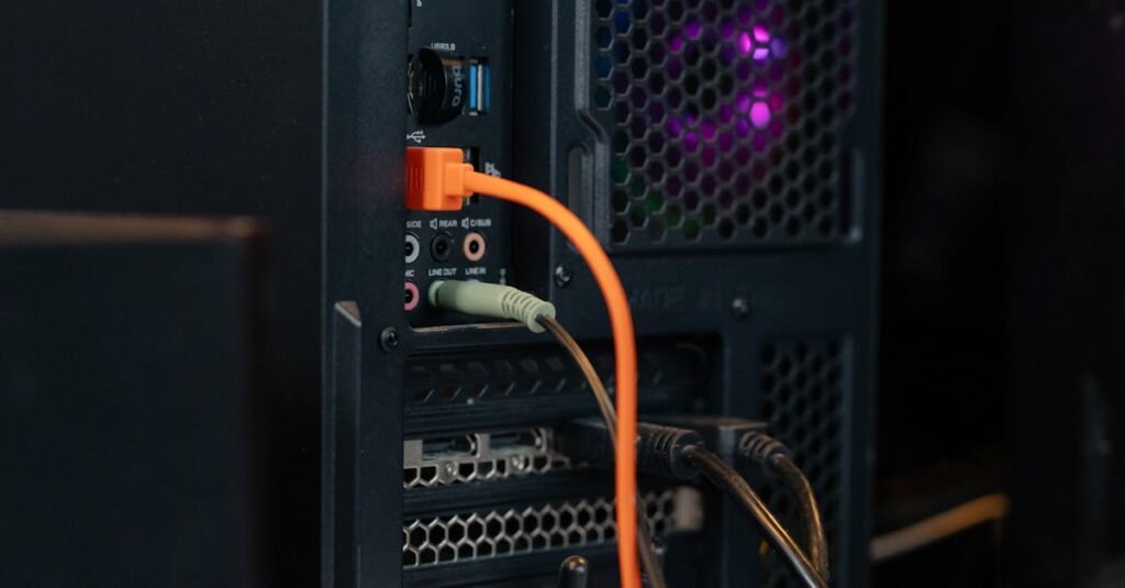 Close-up of a desktop computer tower with connected cables and internal lighting.