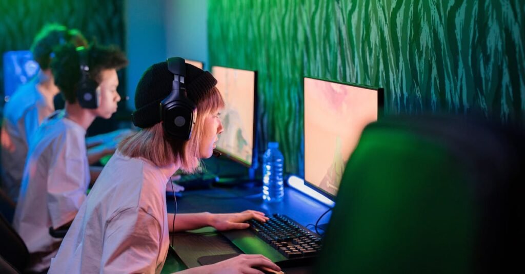 Gamers intensely focused on playing in a vibrant cybercafe environment.